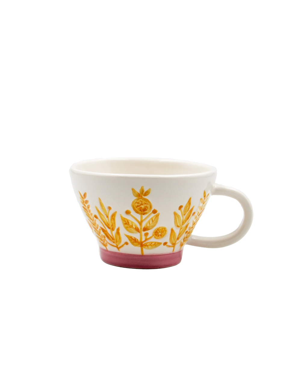 White mug with yellow floral pattern on a white background