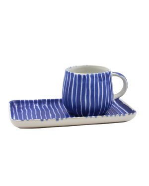 Blue and white striped mug with matching tray on a white background Blue and white striped mug with matching tray on a white background