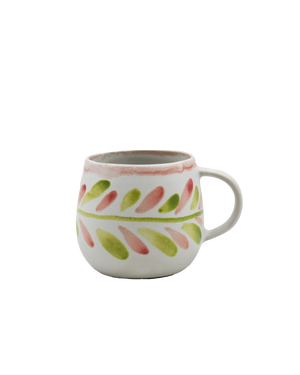 Ceramic mug with floral patterns on a white background Ceramic mug with floral patterns on a white background
