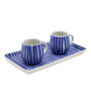 Two blue and white striped ceramic cups with matching saucer on a white background