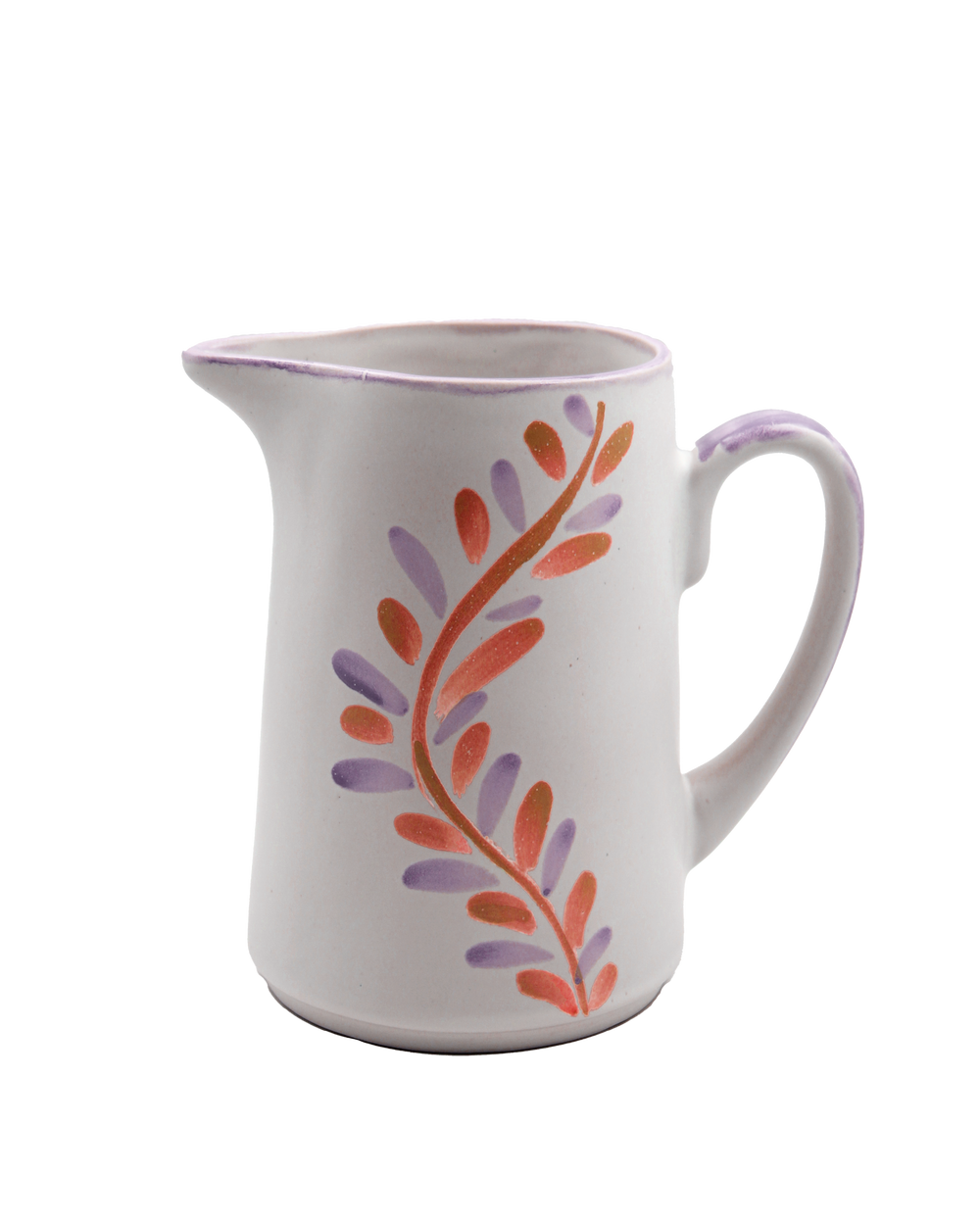 White ceramic pitcher with floral design on a white background