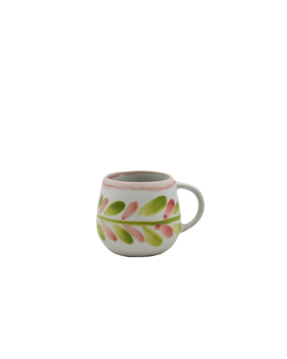 Ceramic mug with floral pattern on a white background