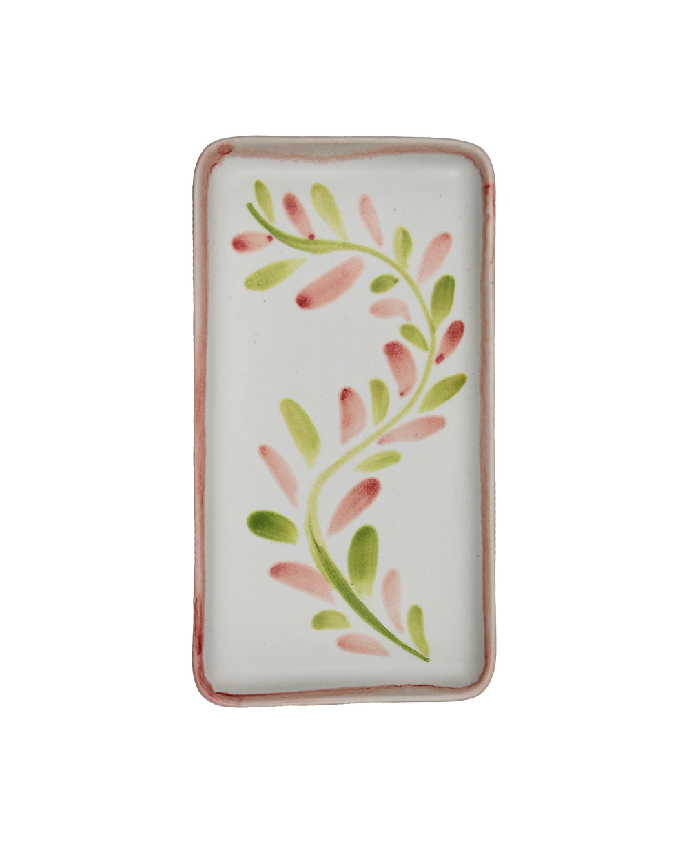 Rectangular white dish with pink and green leaf pattern on a white background
